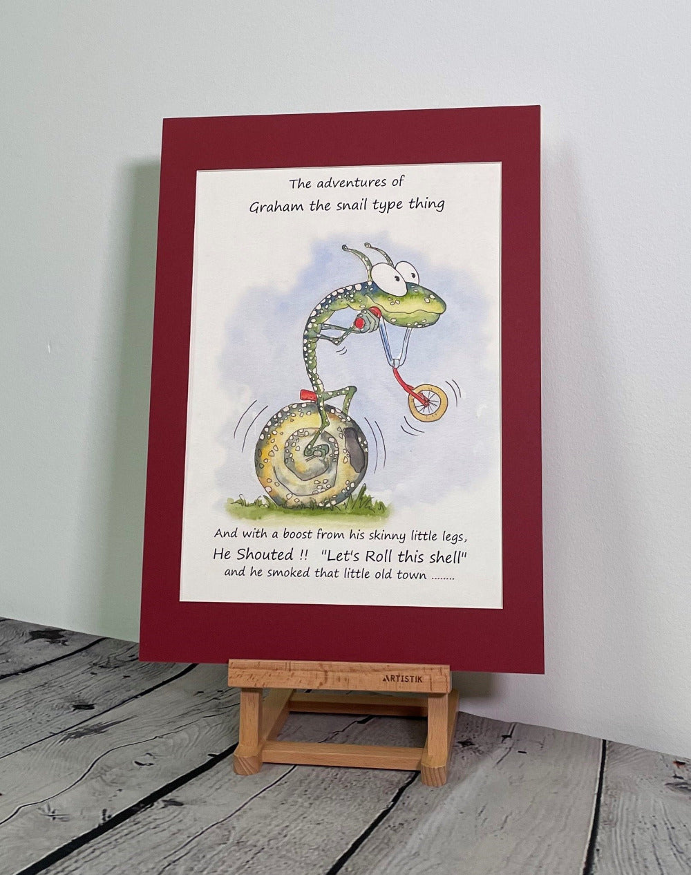 Graham the Snail pedalling his bicycle around town. Dean Reeve Art Prints and originals